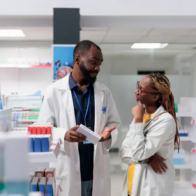 african-american-pharmacist-consulting-buyer-in-ph-2025-02-19-03-54-23-utc